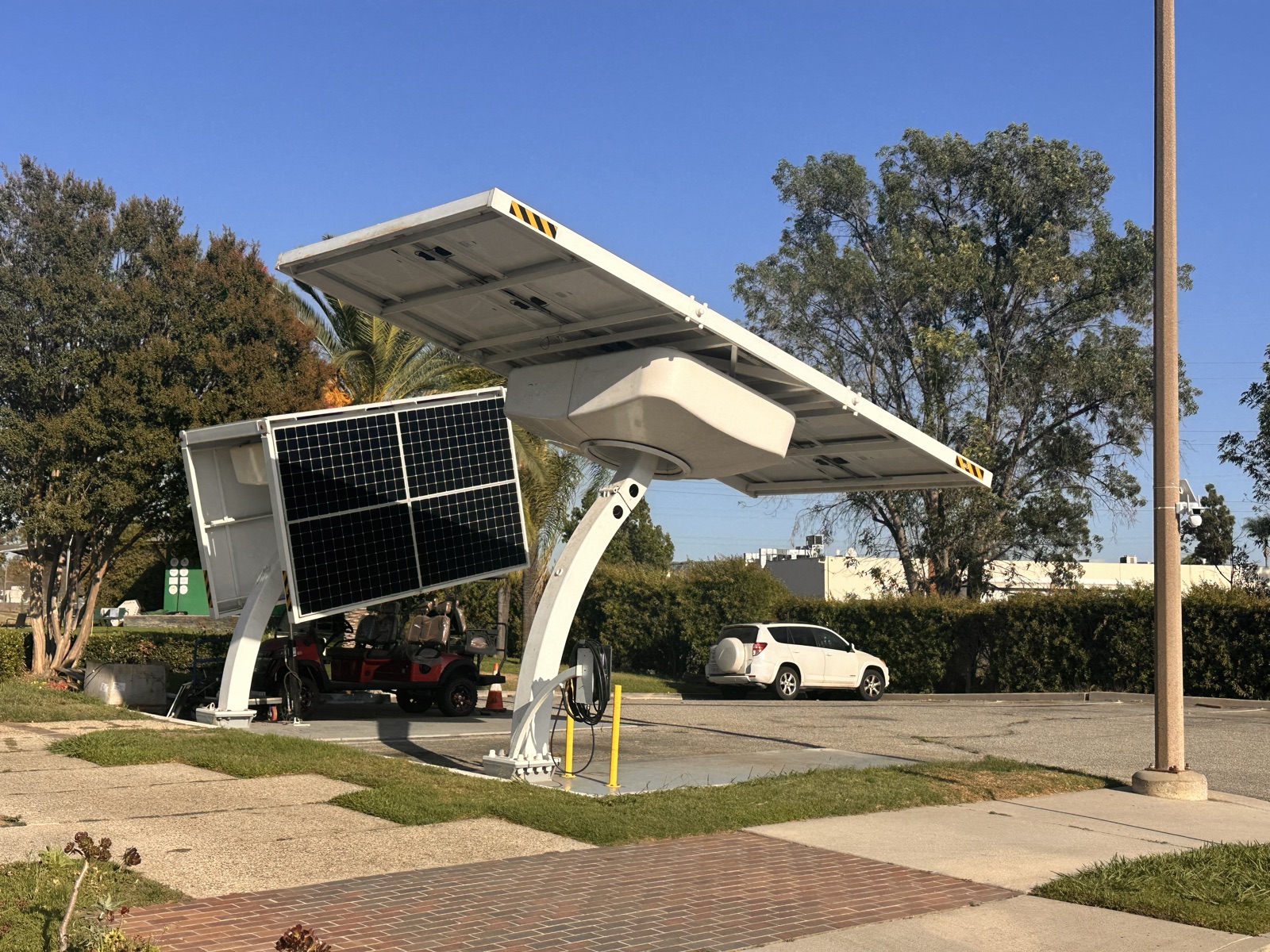 Solar canopy charging installation at a golf course in California